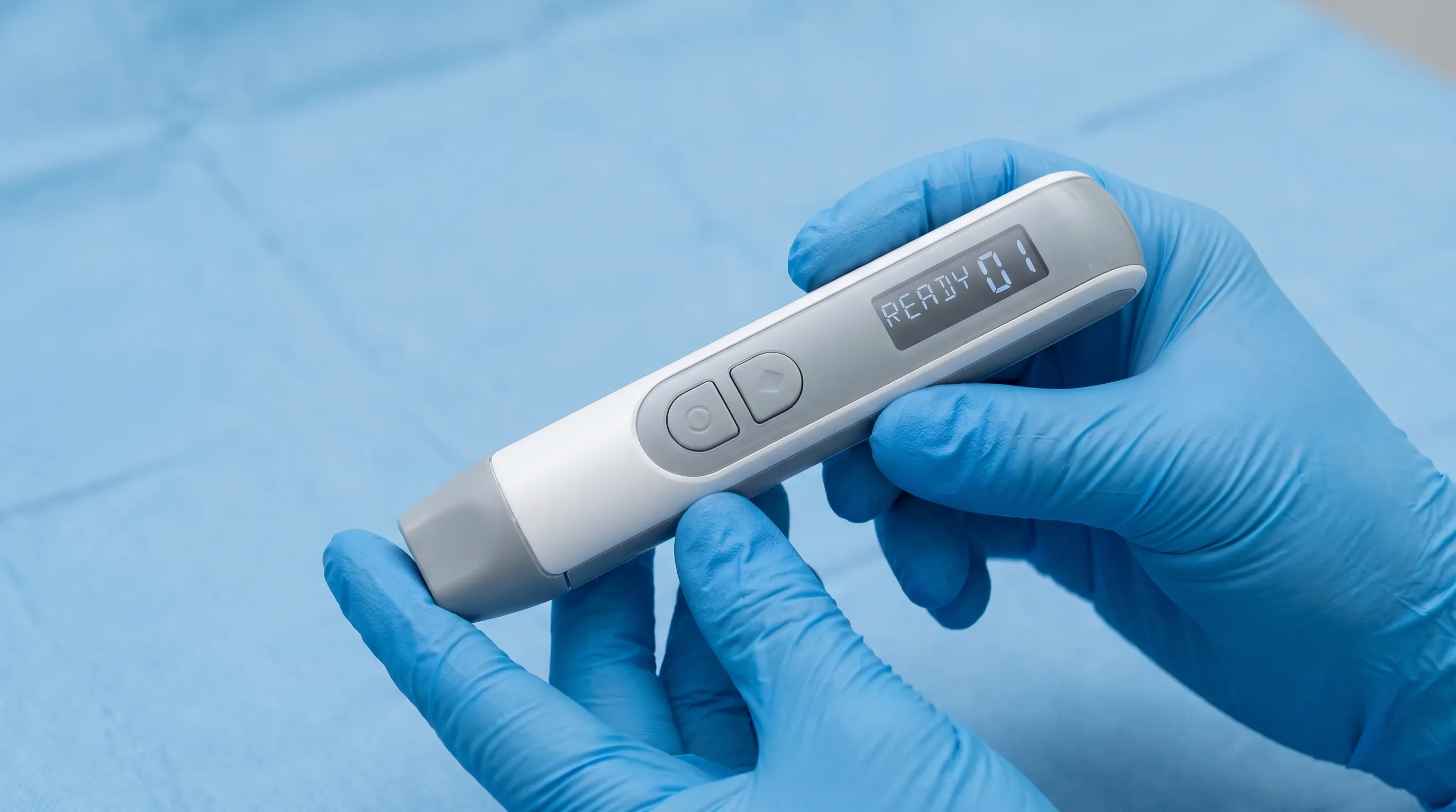 Close-up of a patient demonstrating proper inhaler grip and slow deep inhalation technique against a clinical blue background