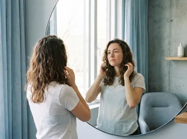 Why Is My Hair So Frizzy? Dermatologist-Backed Causes and Solutions